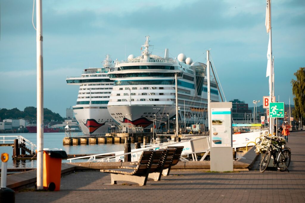 a large cruise ship docked at a pier