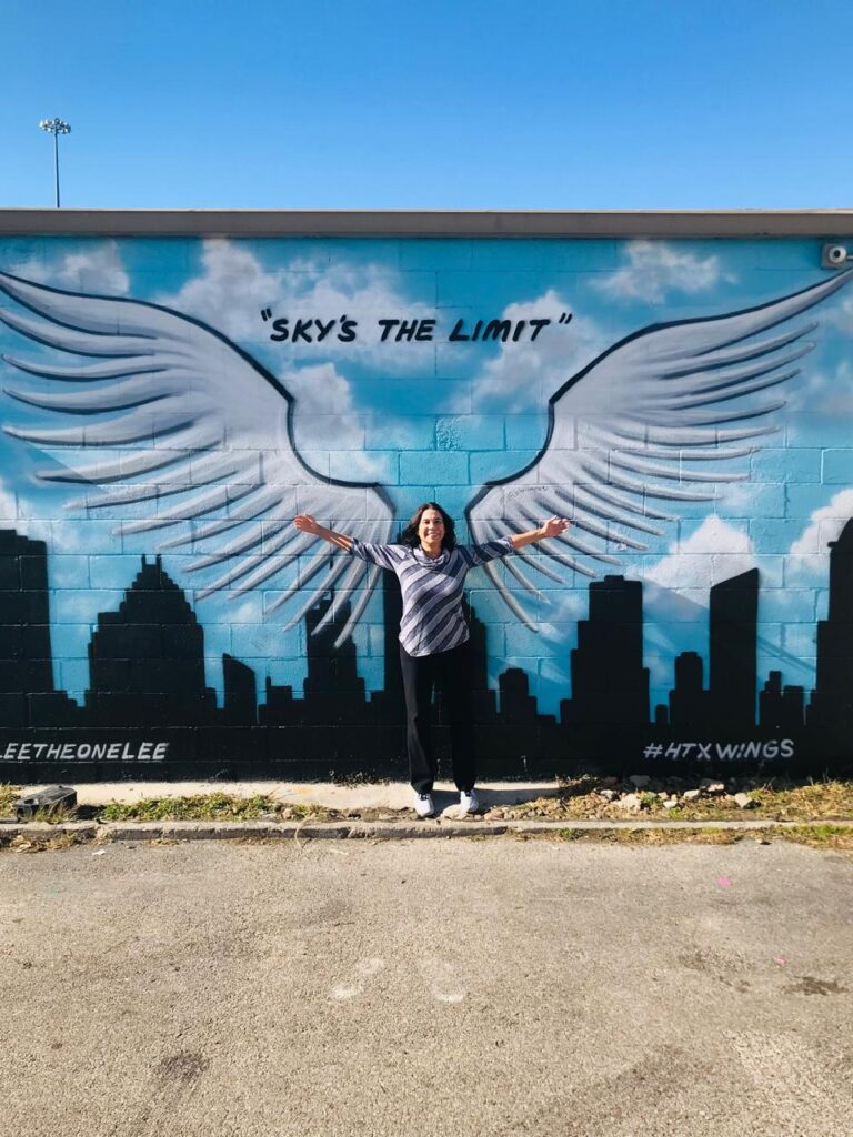 Houston with woman on wings art