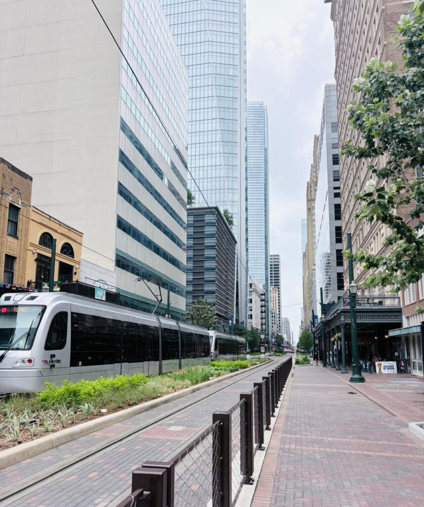 image of Main Street in Houston, Texas with the high rises and metroRail.