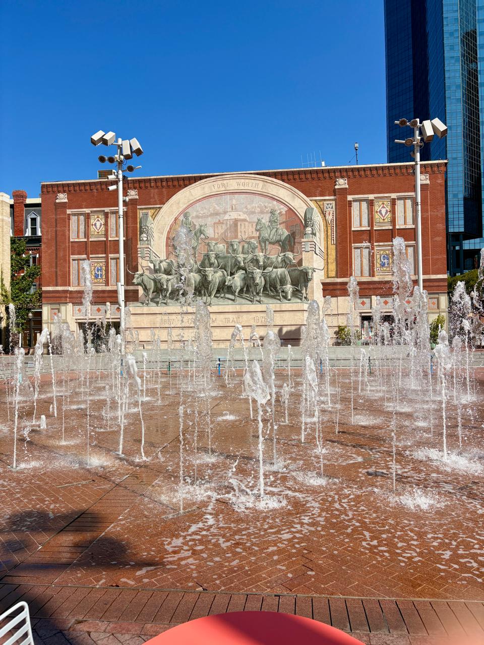 water fountains and a mural at Sundance Square